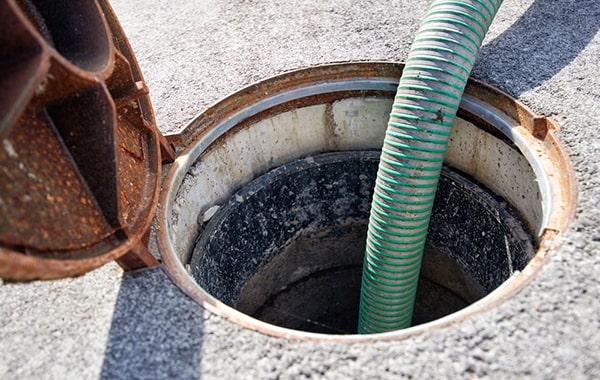 grease trap pumping involves removing built-up grease, oils, and fats from the trap to prevent obstructions in the plumbing system